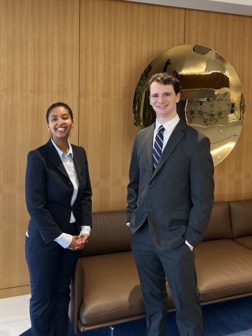 Saron Setotaw on the left and Aiden Wechsler on the right in the Powers Law Lobby.